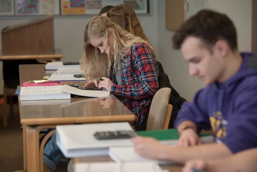 Students working in math class