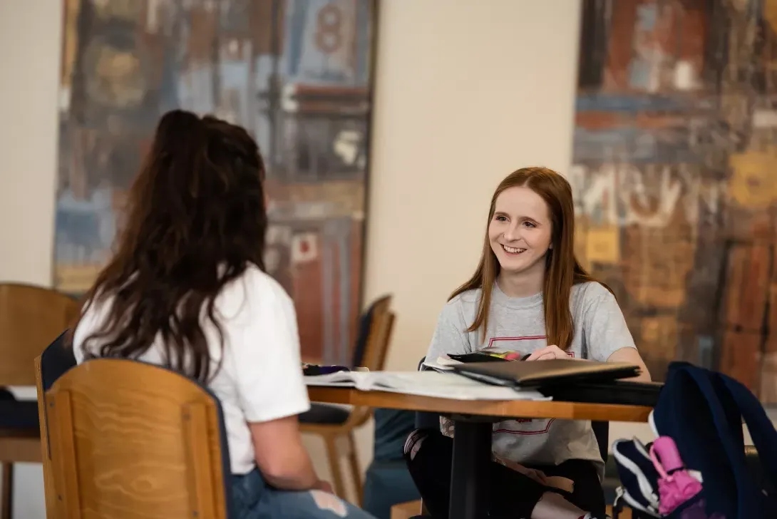 Students sitting and talking in the Student Center